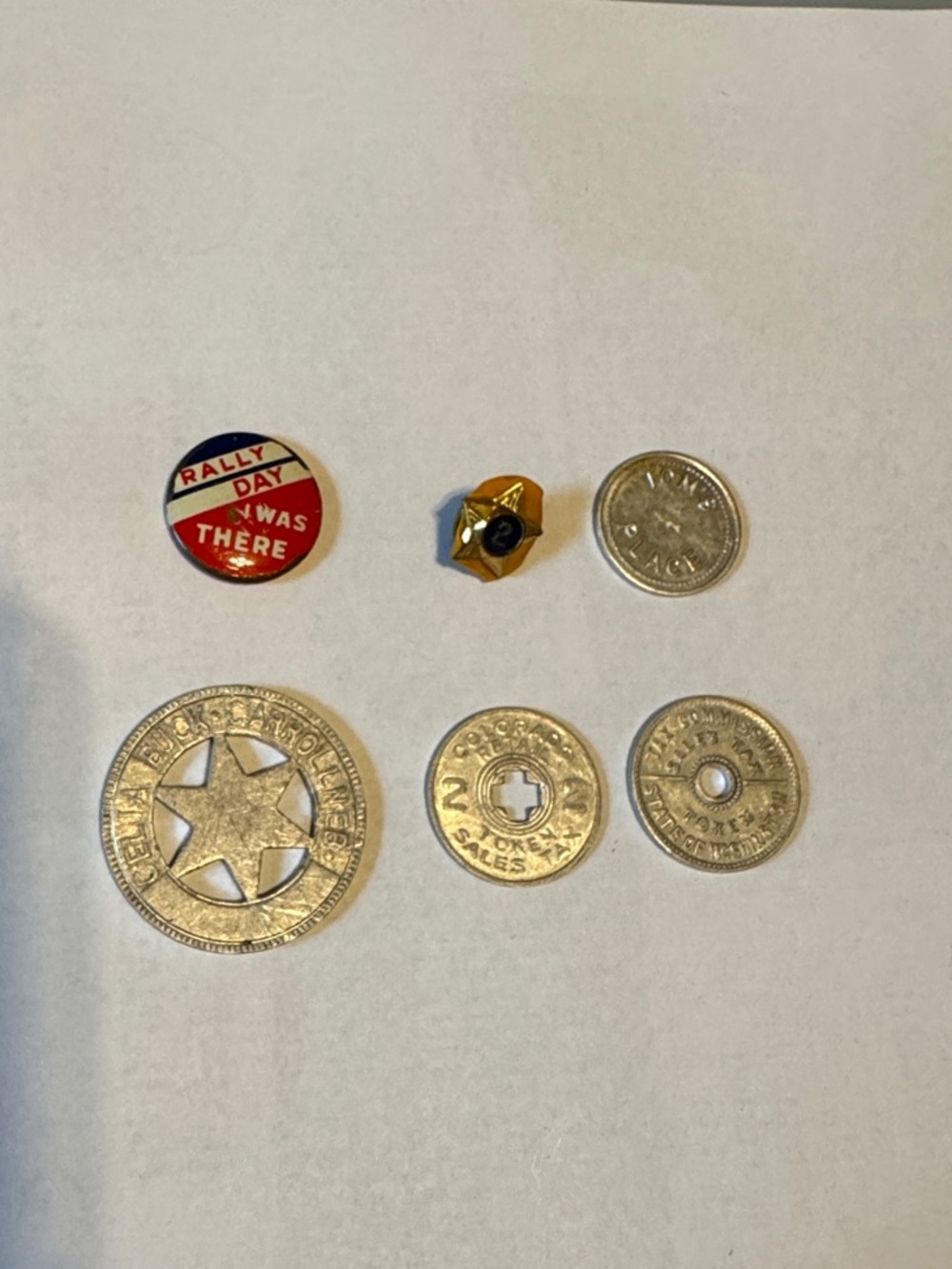 Vintage tokens and pins